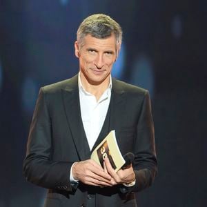 et mon frère me dit : 'Non, elle n'aurait pas aimé ça, il faut que tu y ailles. Donc, j'y suis allé'",  a raconté l'époux de Mélanie Page.

Nagui - Telethon 2013 dans les studios de television de La Plaine-Saint-Denis le 7 Decembre 2013. Le Telethon 2013 a recolte cette annee plus de 78 millions d'euros de promesses de dons