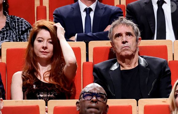 Julien Clerc et sa compagne Hélène Grémillon pendant la cérémonie de remise du prix lumière à I.Huppert lors de la 16ème édition du Festival Lumière à l'Amphithéâtre - Centre de Congrès à Lyon, France, le 18 octobre 2024. © Dominique Jacovides/Bestimage