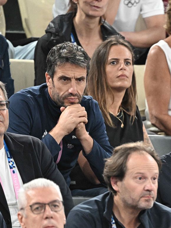 Tony Estanguet et Laure Manaudou lors d'un match de demi-finale de basket-ball masculin entre l'équipe de France et l'équipe d'Allemagne lors de la treizième journée des Jeux Olympiques Paris 2024 à Bercy Arena à Paris, France, le 8 août 2024. Photo by David Niviere/ABACAPRESS.COM