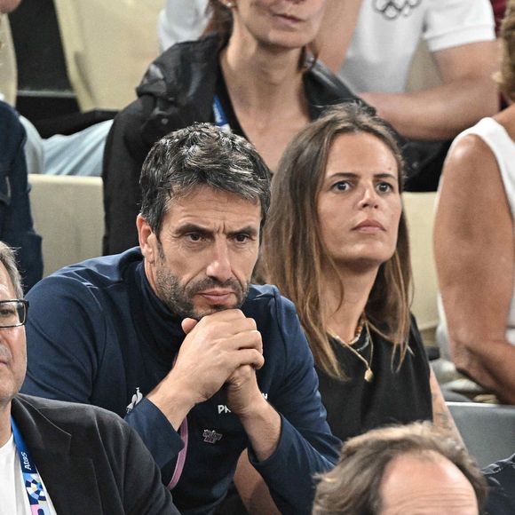 Tony Estanguet et Laure Manaudou lors d'un match de demi-finale de basket-ball masculin entre l'équipe de France et l'équipe d'Allemagne lors de la treizième journée des Jeux Olympiques Paris 2024 à Bercy Arena à Paris, France, le 8 août 2024. Photo by David Niviere/ABACAPRESS.COM
