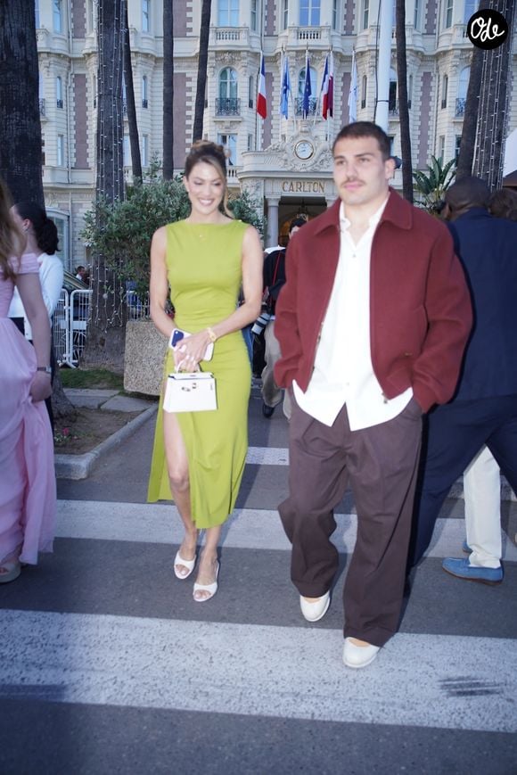 Exclusif - Iris Mittenaere (Miss France 2016 - Miss univers 2017) et son compagnon Antoine Dupont arrivent à la soirée "Kilian Paris" sur la plage du Carlton Beach Club lors du 79ème Festival International du Film de Cannes, le 19 mai 2026.