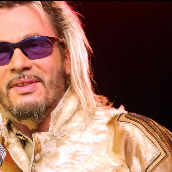 Florent Pagny à l'occasion d'un concert au profit de l'association Laurette Fugain, à Paris, le 18 mai 2003. AGENCE / BESTIMAGE