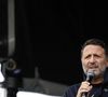 Il veille à préserver une vie normale pour eux malgré tout.

L'animateur et producteur de télévision, Arthur (Jacques Essebag) - Marche en hommage aux victimes de l'attaque du 7 octobre contre Israël par le Hamas, à Paris, le 6 octobre 2024. © Stéphane Lemouton / Bestimage