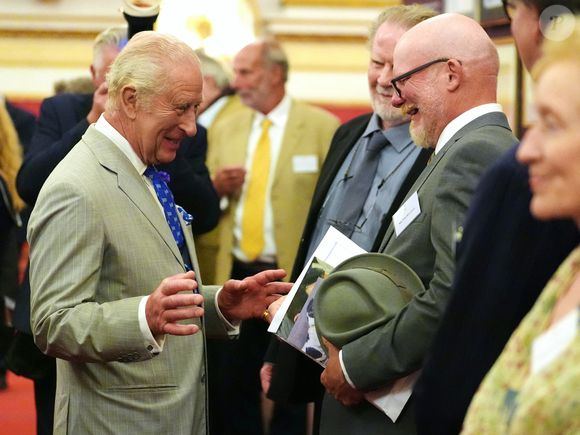 Le roi Charles III d'Angleterre et Camilla Parker Bowles, reine consort d'Angleterre, donnent une réception au palais de Buckingham à Londres, célébrant 40 ans d'artistes accompagnant les visites officielles à l'étranger, le 9 juillet 2025. ALPHA AGENCY / BESTIMAGE