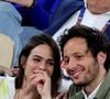 Et ce n'est pas la première fois pourtant que l'homme fait ce type d'expérience introspective. La dernière en date lui a même fait perdre 12 kilos.
Le chanteur Vianney et sa femme Catherine Robert en tribunes lors des Internationaux de France de Tennis de Roland Garros 2025, à Paris, France, le 6 juin 2025. © Jacovides-Moreau/Bestimage