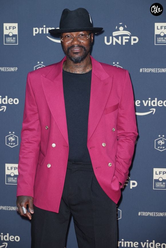 Amateur de mode, c'est aussi un grand fan de musique...

Djibril Cissé assistant à la 30e cérémonie de remise des Trophées de l'UNFP au Pavillon Gabriel à Paris, en France, le 15 mai 2022. Photo Jérôme Domine/ABACAPRESS.COM