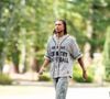 Formé à Chelsea, il évolue principalement au poste de latéral droit.

Michael Olise - Les joueurs de l'équipe de France de football ont soigné leur style vestimentaire pour leur arrivée au centre national du football de Clairefontaine-en-Yveline, France, le 1er septembre 2025. © Pierre Perusseau/Bestimage