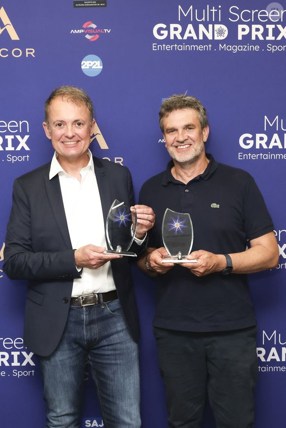 Exclusif - Éric Besnard Présentateur du Multiplex Ligne des Champions Canal+ , Hervé Mathoux - Première édition du Multi Screen Grand Prix : une célébration inédite de la création audiovisuelle française dans le cadre prestigieux du Pullman Paris Tour Eiffel sous la présidence de S. Martin (Directeur Général de l'ARPP : l'Autorité de Régulation Professionnelle de la Publicité et également Président de La Fabrique des Formats) et animée par E. Eméyé (journaliste et présentatrice).
Cet événement a rassemblé les professionnels de l'audiovisuel autour d'une ambition commune : mettre à l'honneur l'excellence de la création française tous formats confondus. Paris le 12 juin 2025 - © Jack Tribeca / Bestimage
