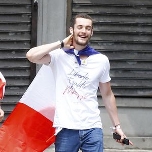 Exclusif - Louis Sarkozy est allé regarder le match France-Croatie (4-2) le jour de la finale de la Coupe du Monde de Football 2018 avec sa femme Natali Husic (t-shirt rouge aux couleurs de la Croatie) et des amis au restaurant La Defense à New York, le 15 juillet 2018. 
© Charles Guerin/Bestimage USA