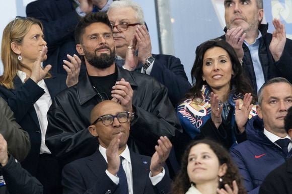 Olivier Giroud et sa femme Jennifer Giroud, Philippe Diallo - Célébrités dans les tribunes du quart de finale de la Ligue des Nations de l'UEFA 2025 "France - Croatie (2-0 / tab 5-4)" au Stade de France à Saint-Denis le 23 mars 2025. © Cyril Moreau/Bestimage