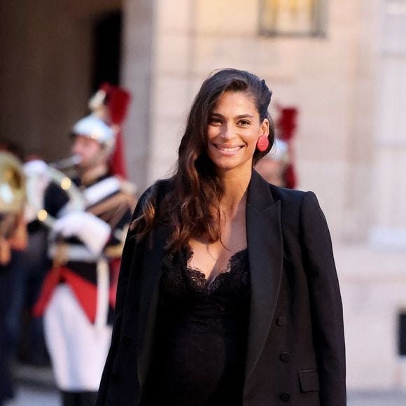 Tatiana Silva (enceinte, ancienne miss Belgique) arrivant au dîner d'état au palais de l'Elysée à Paris en l'honneur de la visite du roi et de la reine de Belgique en France le 14 octobre 2024.

© Dominique Jacovides / Bestimage