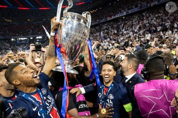 Presnel Kimpembe et Marquinhos - Le PSG remporte la Ligue Des Champions 2025, pour la première fois de son histoire, face à l'Inter Milan (5-0) à l'Allianz Arena de Munich, le 31 mai 2025.
© Cyril Moreau/Bestimage