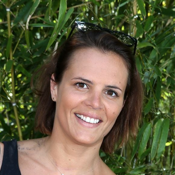 Laure Manaudou, ancienne championne de natation, jongle aujourd'hui avec trois enfants aux âges bien distincts.

Laure Manaudou - People dans le village lors de la finale du tournoi de tennis de Roland-Garros à Paris. © DOMINIQUE JACOVIDES / BESTIMAGE