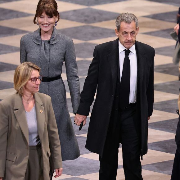 Carla Bruni et son mari Nicolas Sarkozy - Cérémonie de réouverture de la cathédrale Notre-Dame de Paris, le 7 décembre 2024. Joyau de l’art gothique, lieu de culte et de culture, symbole universel de la France et de son histoire, la cathédrale de Notre-Dame de Paris rouvre ses portes les 7 et 8 décembre, cinq ans après le terrible incendie qui l’avait ravagée le 15 avril 2019. 
© Dominique Jacovides / Bestimage