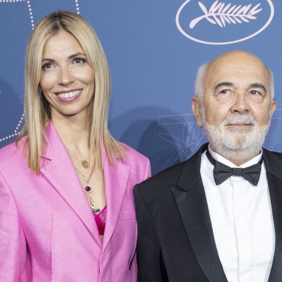 Amoureux de Patricia Campi, Gérard Jugnot s'est marié à cette ancienne juriste de Marseille de 20 ans sa cadette

Gérard Jugnot et sa femme Patricia Campi - Photocall du dîner d'ouverture du 75ème Festival International du Film à Cannes.
© Borde-Jacovides-Moreau / Bestimage