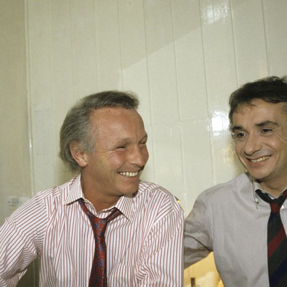 Archives - En France, à Paris, portrait de Jacques Revaux avec Michel Sardou en novembre 1986.