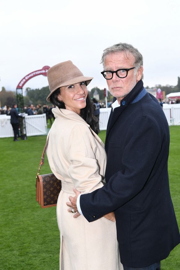 Franck Dubosc et sa femme Danièle au prix Qatar Arc de Triomphe à l'Hippodrome de Longchamp le 6 octobre 2024. © Rachid Bellak / Bestimage