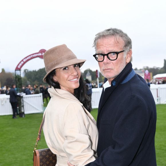 Franck Dubosc et sa femme Danièle au prix Qatar Arc de Triomphe à l'Hippodrome de Longchamp le 6 octobre 2024. © Rachid Bellak / Bestimage
