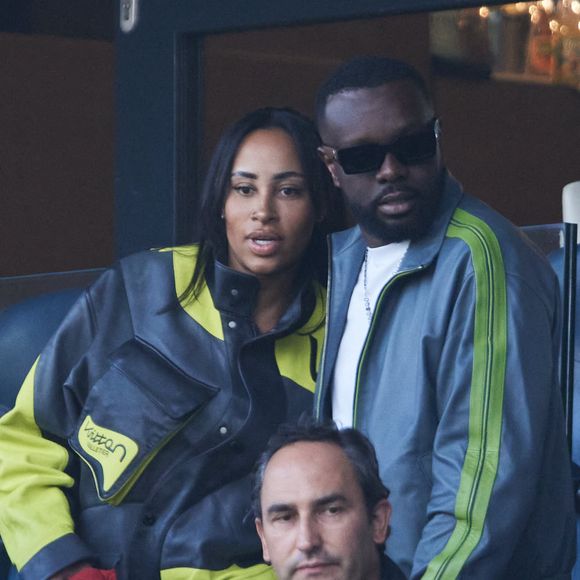 Gims et sa femme Demdem - Célébrités dans les tribunes de la demi-finale retour de Ligue des champions entre le PSG face au Borussia Dortmund (0-1) au Parc des Princes à Paris le 7 mai 2024. © Cyril Moreau/Bestimage