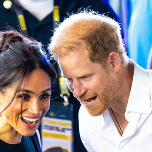 Le prince Harry, duc de Sussex et Meghan Markle, duchesse de Sussex, assistent à la finale de natation lors des Invictus Games 2023 à Dusseldorf, le 13 septembre 2023.