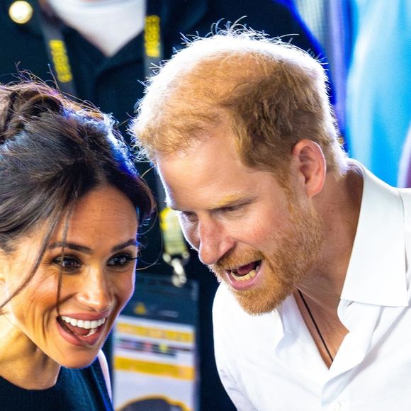 Le prince Harry, duc de Sussex et Meghan Markle, duchesse de Sussex, assistent à la finale de natation lors des Invictus Games 2023 à Dusseldorf, le 13 septembre 2023.