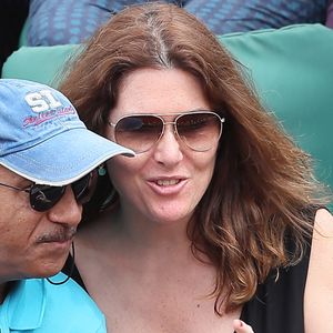 Pascal Legitimus et sa femme Adriana Santini en tribune lors des internationaux de tennis de Roland Garros le 28 mai 2018. © Dominique Jacovides / Cyril Moreau / Bestimage