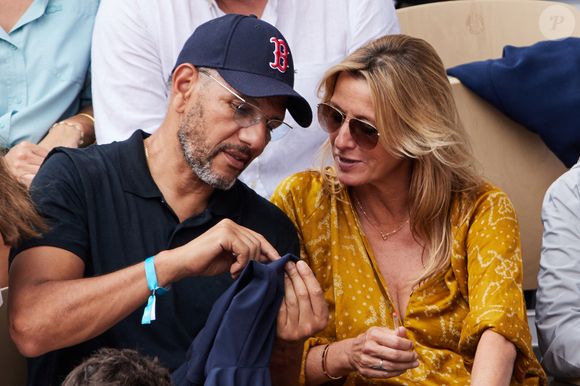 Roschdy Zem et Sarah Poniatowski à Roland Garros 2023 à Paris, le 11 juin 2023. 

Photo : Jacovides-Moreau / Bestimage