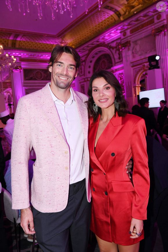 Camille Lacourt et sa compagne Alice Detollenaere - Photocall du 5ème gala de charité de l'association "Les Bonnes Fées" à l'occasion de la campagne mondiale "Octobre Rose" à l'hôtel Peninsula, Paris le 3 octobre 2024. © Rachid Bellak/Bestimage