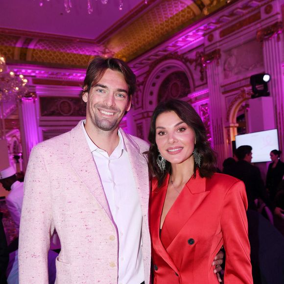 Camille Lacourt et sa compagne Alice Detollenaere - Photocall du 5ème gala de charité de l'association "Les Bonnes Fées" à l'occasion de la campagne mondiale "Octobre Rose" à l'hôtel Peninsula, Paris le 3 octobre 2024. © Rachid Bellak/Bestimage