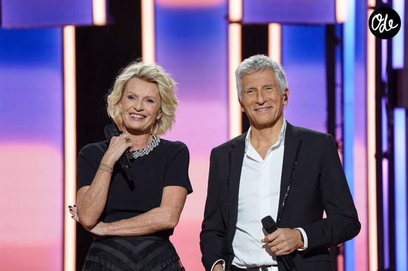 Nagui, Sophie Davant lors de la deuxième soirée de la 39ème édition du Téléthon sur France 2 aux Studios du Lendit à Saint-Denis, France, le 6 décembre 2025. Les trente heures du Téléthon 2025 s'achèvent sur un compteur de 83,5 millions d'euros. © Anne-Sophie Guebey/Bestimage