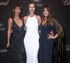 Glamour, Carla Bruni n'a pas manqué d'humour en plaisantant sur sa petite taille à côté de ses copines Eva Herzigova et Helena Christensen

Helena Christensen, Eva Herzigova, Carla Bruni - Photocall du dîner "Chopard Universe 2025" à l'aéroport de Mandelieu lors du 78ème Festival International du Film de Cannes le 19 mars 2025. © Olivier Borde/Bestimage