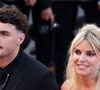 En voix off sur des images retraçant leur histoire, Sophie Tapie y raconte sa rencontre avec Baptiste Germain, aujourd’hui son mari et père de ses deux enfants...
Baptiste Germain, Sophie Tapie - Montée des marches du film « Elémentaire » pour la cérémonie de clôture du 76ème Festival International du Film de Cannes, au Palais des Festivals à Cannes. Le 27 mai 2023 © Jacovides-Moreau / Bestimage