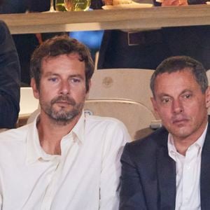 François Roelants et son mari Marc-Olivier Fogiel - Personnalités dans les tribunes lors des Internationaux de France de tennis de Roland Garros 2024 à Paris. Le 29 mai 2024
© Jacovides-Moreau / Bestimage