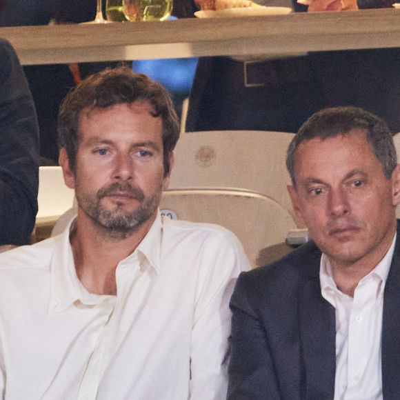François Roelants et son mari Marc-Olivier Fogiel - Personnalités dans les tribunes lors des Internationaux de France de tennis de Roland Garros 2024 à Paris. Le 29 mai 2024
© Jacovides-Moreau / Bestimage