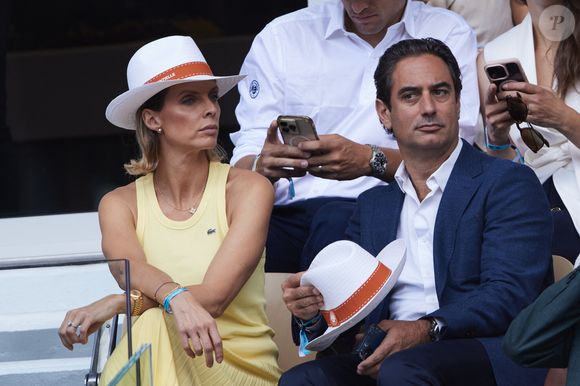 Sylvie Tellier et son mari Laurent Schenten - Célébrités dans les tribunes de la finale homme des Internationaux de France de tennis de Roland Garros 2024 à Paris le 9 juin 2024. © Jacovides-Moreau/Bestimage