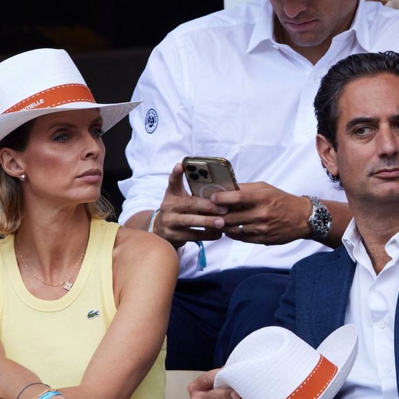 Sylvie Tellier et son mari Laurent Schenten - Célébrités dans les tribunes de la finale homme des Internationaux de France de tennis de Roland Garros 2024 à Paris le 9 juin 2024. © Jacovides-Moreau/Bestimage
