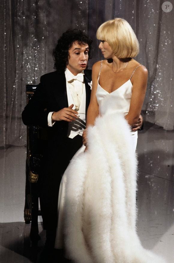 En France, à Paris, Michel Sardou et Mireille Darc sur un plateau le 8 décembre 1978. ©  Michel Ristroph via Bestimage