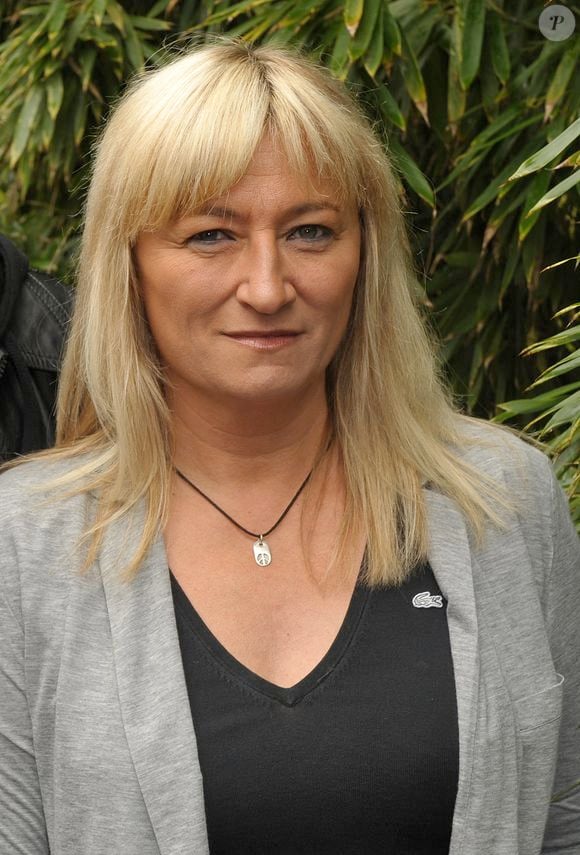 Christine Bravo et son petit ami arrivent à l'espace VIP 'Le Village' pendant les Internationaux de France de Tennis 2009 à Roland Garros à Paris, France le 6 juin 2009. Photo by Gorassini-Guignebourg/ABACAPRESS.COM