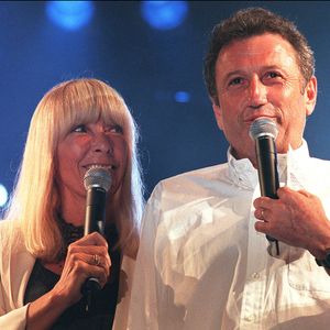 Michel Drucker et son épouse Dany Saval lors du Concert des Alpilles, organisé par Michel Drucker pour récolter des fonds pour le soutien à l'enfance dans le sud de la France. Maussane, France, 07/07/2000 © Lionel Hahn/ABACA.