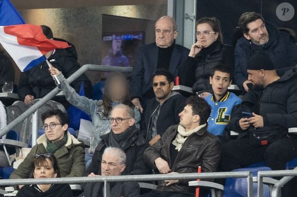 Pierre Lescure, Jamel Debbouze, Mélissa Theuriau et leurs deux enfants Leon Debbouze et Lila Debbouze dans les tribunes du quart de finale de la Ligue des Nations de l'UEFA 2025 "France - Croatie (2-0 / tab 5-4)" au Stade de France à Saint-Denis le 23 mars 2025.

© Cyril Moreau/Bestimage