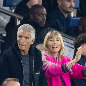 Nagui et Melanie Page dans les tribunes du match de football de qualification pour la coupe du monde 2026 opposant la France à Azerbaïdjan (3-0) au Parc des Princes à Paris, France, le 10 octobre 2025. © Cyril Moreau/Bestimage