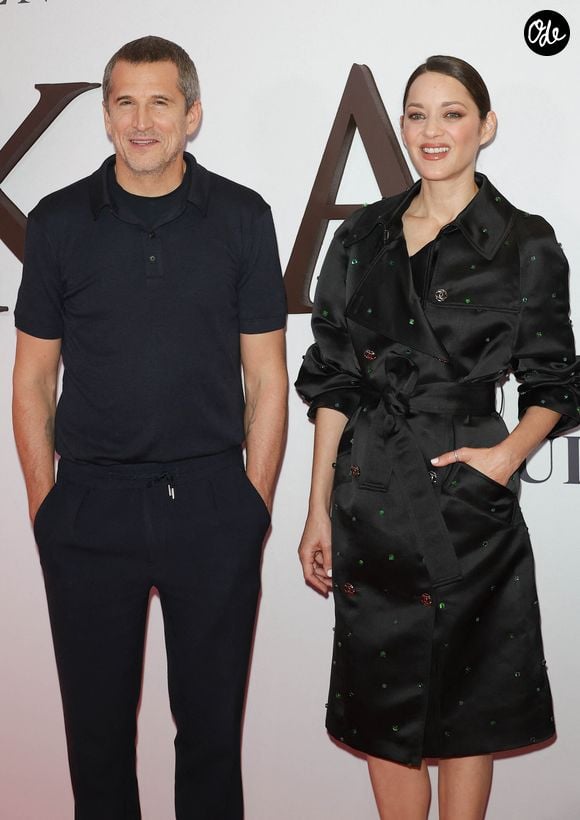 Guillaume Canet (réalisateur du film "Karma") et Marion Cotillard au photocall de la première du film "Karma" au cinéma Pathé Palace à Paris le 13 octobre 2026. 

© Coadic Guirec / Bestimage