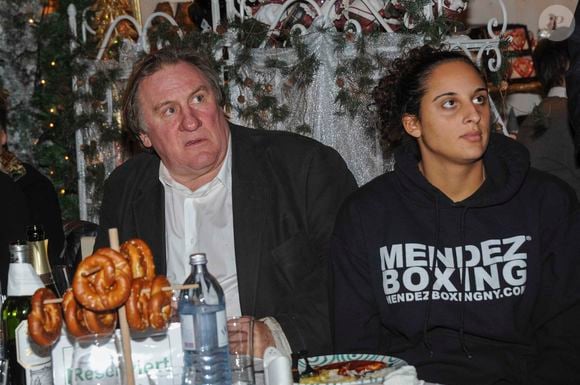 Gérard Depardieu et sa fille Roxanne posent à l'ouverture du marché de Noël traditionnel sur Aiderbichl, le paradis des animaux pour les sans-abris, le 14 novembre 2013 dans le village de Henndorf près de Salzbourg en Autriche. Photo Breuel-Bild/DPA/ABACAPRESS.COM
