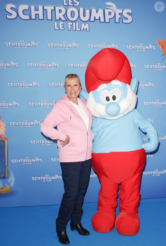Celle qui prête sa voix à Enjouée, le grimoire du nouvel opus des Schtroumpfs dans les salles mercredi 16 juillet, s'est confiée à "Télé-Loisirs". 

Dorothée - Avant-première parisienne du film "Les Schtroumpfs" au cinéma le Grand Rex à Paris le 6 juillet 2025. 
© Coadic Guirec / Bestimage