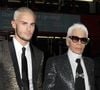 Sept ans après la mort de Karl Lagerfeld, son héritage reste fragilisé par des complications judiciaires et fiscales.

Karl Lagerfeld et Baptiste Giabiconi (blond platine) - Arrivée des people au vernissage de l'exposition "Mademoiselle Privé" à la Galerie Saatchi à Londres. © Agence / Bestimage