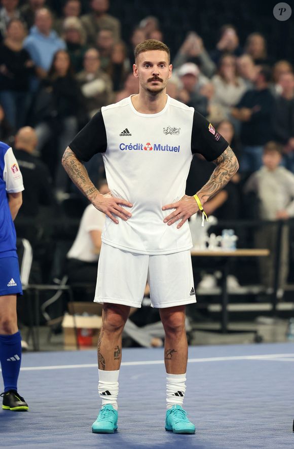 Matt Pokora (M. Pokora) - Match de futsal lors de la nouvelle édition du Foot-Concert organisé par le Réseau A.Ma.N.D./Huntington Avenir à la LDLC Arena à Lyon le 11 Novembre 2024. Cet événement solidaire unique en France rassemble le sport et la musique pour lutter contre les maladies neurodégénératives. © Dominique Jacovides/Bestimage