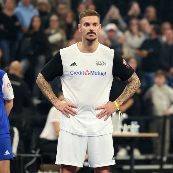 Matt Pokora (M. Pokora) - Match de futsal lors de la nouvelle édition du Foot-Concert organisé par le Réseau A.Ma.N.D./Huntington Avenir à la LDLC Arena à Lyon le 11 Novembre 2024. Cet événement solidaire unique en France rassemble le sport et la musique pour lutter contre les maladies neurodégénératives. © Dominique Jacovides/Bestimage