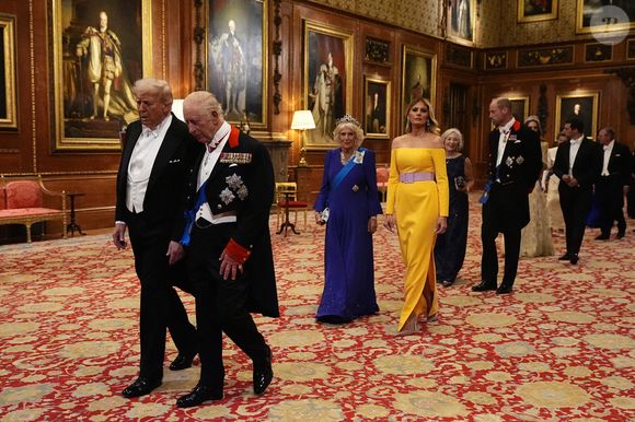Le roi Charles III et le président américain Donald Trump, suivis de la reine Camilla et de la première dame Melania Trump, du prince de Galles et de Mme Paula Reynolds et de la princesse de Galles et de Michael Boulos, marchent lors du banquet d'État au château de Windsor, dans le Berkshire, au premier jour de la deuxième visite d'État du président au Royaume-Uni avec son épouse. Mercredi 17 septembre 2025. Photo by Aaron Chown/PA Wire/ABACAPRESS.COM
