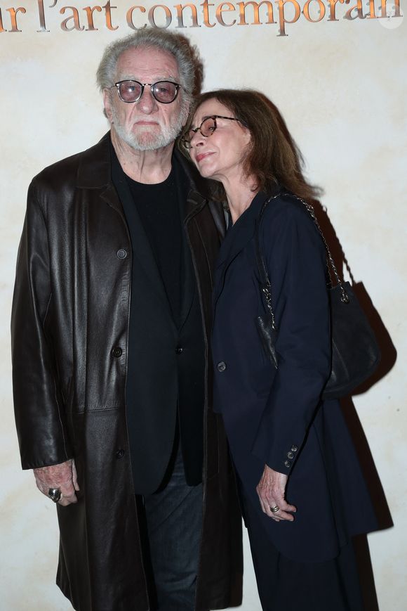 Eddy Mitchell et sa femme Muriel Bailleul - « Voir venir Venir voir », Célébration des 40 ans de la Fondation Cartier pour l'art contemporain avec la « Traversée du chantier de la nouvelle Fondation Cartier »,  place du Palais Royal, dont l'ouverture se fera en décembre 2025. Paris, France, le 18 octobre 2024. © Bertrand Rindoff/Bestimage