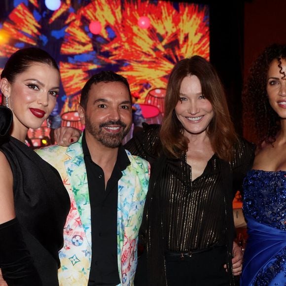 Iris Mittenaere, Kamel Ouali, Carla Bruni-Sarkozy, Noémie Lenoir au dîner de gala organisé par la Fondation "Children of Africa" à l'initiative de Madame D.Ouattara, Première Dame de Côte d'Ivoire et Présidente fondatrice de "Children of Africa" au Sofitel Ivoire à Abidjan. Le 1er Mars 2024. © Dominique Jacovides / Bestimage